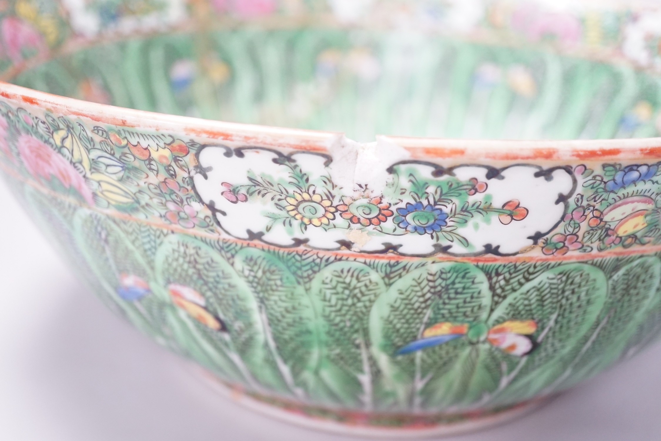 A large Chinese Canton famille rose ‘cabbage’ punch bowl, early 20th century, 37cm diameter